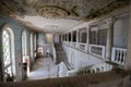 The hall of the mansion with a marble staircase and columns Royalty Free Stock Photo