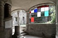 Hall of an old house with arched bay window and multicolored stained glass Royalty Free Stock Photo