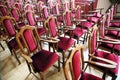 Hall of performances with empty red chairs Royalty Free Stock Photo