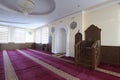 Hall for praying iwan of a mosque with minbar pulpit Royalty Free Stock Photo