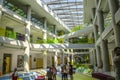 The hall-vestibule with a place for rest and different events, meetings in the international College in Dilijan is illuminated by