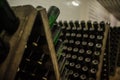 hall of white sparkling wine bottles in the winery cellar Royalty Free Stock Photo