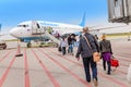 Boarding on POBEDA airlines Russian lowcost Jet airplane in airport