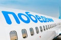 Boarding on POBEDA airlines Russian lowcost Jet airplane in airport Royalty Free Stock Photo