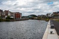 Halle, Flemish Region, Belgium,Banks of the canal with renovated apartment blocks and a cycling trail