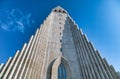 Hallgrimskirkja Cathedral in Reykjavik, Iceland. It is a lutheran parish church. Exterior in a sunny summer day with a blue sky Royalty Free Stock Photo