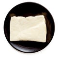 Halloumi Cheese on Black Plate Isolated Royalty Free Stock Photo