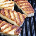 Grilling Halloumi Cheese Royalty Free Stock Photo
