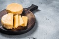 Halloumi sliced cheese on kitchen table. Gray background. Top view. Copy space Royalty Free Stock Photo