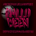 Halloween alphabet font. Brush stroke blood letters and numbers.