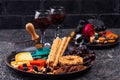 Halloween appetizers. Cheese plate with snacks