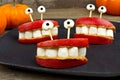 Halloween apple, marshmallow, peanut butter monster teeth snack Royalty Free Stock Photo