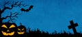 HALLOWEEN background banner template -Silhouette of scary carved luminous cartoon pumpkins, bat, cross and trees isolated in dark Royalty Free Stock Photo