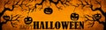 HALLOWEEN background banner wide panoramic panorama template -Silhouette of scary carved luminous cartoon pumpkins and spiders Royalty Free Stock Photo