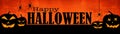 HALLOWEEN background banner wide panoramic panorama template -Silhouette of scary carved luminous cartoon pumpkins and spiders Royalty Free Stock Photo