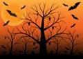 Halloween background with bats and dead trees.