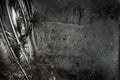 Halloween background with black raven feathers on dark grunge backdrop. Horror gothic abstract design with copyspace. Closeup of Royalty Free Stock Photo