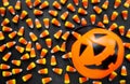 Halloween Background. Candy corn candies, pumpkin basket. Traditional sweet Treats. Copy space Royalty Free Stock Photo