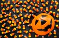 Halloween Background Candy corn candies, pumpkin basket. Traditional sweet Treats. Copy space Royalty Free Stock Photo