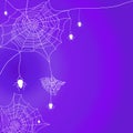 Halloween background with cobweb and hanging spider on purple background. Royalty Free Stock Photo