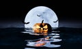 Halloween background 3d rendering. Spooky pumpkin scary scene on The ocean with the full moon and bats on dark night blue of the Royalty Free Stock Photo