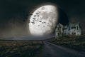 Halloween background with full moon and creepy house Royalty Free Stock Photo