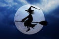 Halloween background with full moon and flying witch