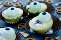 Halloween background. Funny cake with edible eyes for Halloween