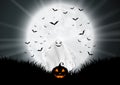 Halloween background with ghost and pumpkin in moonlit landscape Royalty Free Stock Photo
