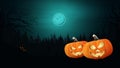 Halloween background, Halloween pumpkins in the dark forest Royalty Free Stock Photo