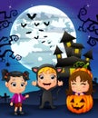 Halloween background with happy girl wearing costume cat, little girl and girl smiling in basket pumpkin Royalty Free Stock Photo