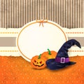 Halloween background with label, pumpkins and hat Royalty Free Stock Photo
