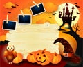 Halloween background with old sign, pumpkins, hat and photo frames Royalty Free Stock Photo