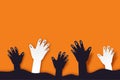 Halloween background paper art style.Zombie hand rising from graveyard Royalty Free Stock Photo