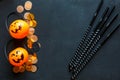 Halloween background with pattern of jack lanterns on black background. creative decoration, celebration, autumn