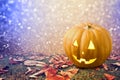 Halloween background with pumkin jack lantern on grass