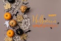 Halloween background with pumpkins, bats, spider web and ghosts top view. Holiday card with text Happy halloween Royalty Free Stock Photo