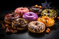 Halloween background. Set of donuts on a black plate