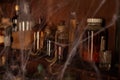 Halloween background Shelves with alchemy tools Skull spiderweb bottle with poison candles