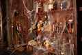 Halloween background Shelves with alchemy tools Skull spiderweb bottle with poison candles