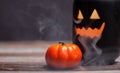 Halloween pumpkin with smoke and light in the dark night Royalty Free Stock Photo