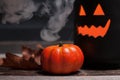 Halloween pumpkin with smoke and light in the dark night Royalty Free Stock Photo