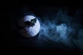 Halloween background. Spooky scary dark night full moon and bats. Royalty Free Stock Photo