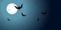 Halloween banner with flying black bats over the moon on a dark background Royalty Free Stock Photo