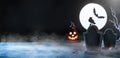 Halloween banner. Tombstone in a cemetery. Scary cemetery in fog at night by the light of the moon.
