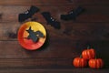 Halloween bats, witch and pumpkins