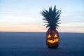 Halloween on Beach. Pineapple jack o lantern