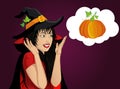 Halloween. Beautiful woman in hat and witch costume is surprised