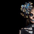 Halloween beauty portrait of a skeleton woman of death, the makeup on the face. Girl death Halloween costume. Day of The Dead. Royalty Free Stock Photo