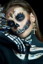 Halloween beauty skeleton woman makeup face. Girl death Halloween costume. Day of The Dead. Charming and dangerous Calavera Royalty Free Stock Photo